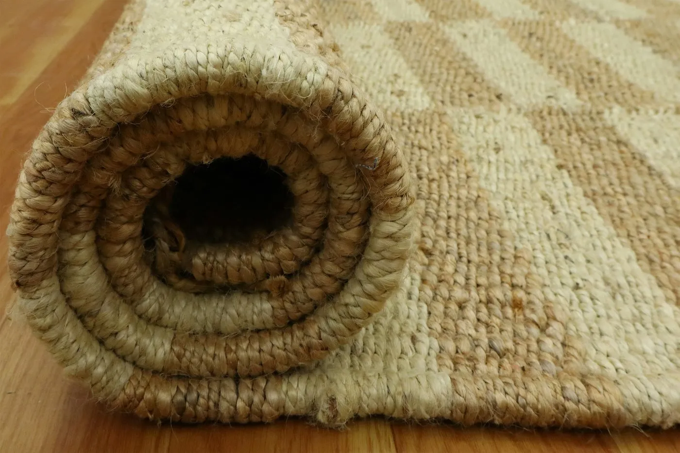 Close-up of a rolled jute rug